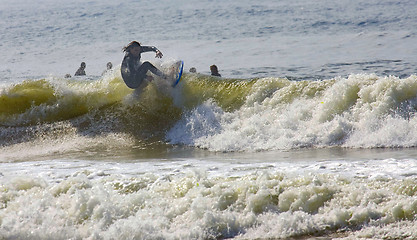 Image showing Backlit surfer