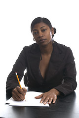 Image showing pretty woman at desk