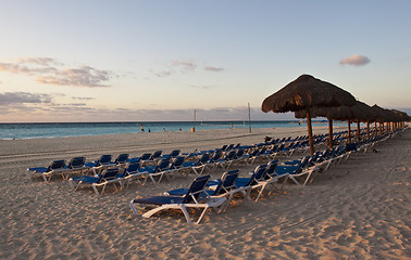 Image showing Sraw umbrella at sandy beach