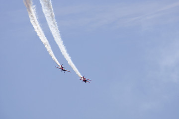 Image showing Two planes performing in an air show