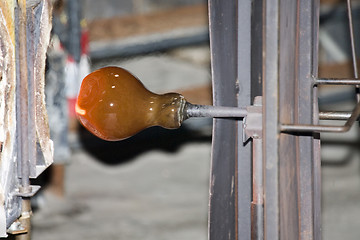 Image showing Glass furnace. Glass Blower at Work