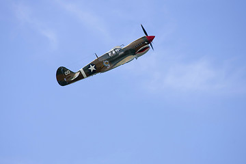 Image showing A plane performing in an air show 