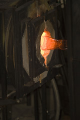 Image showing Glass furnace. Glass Blower at Work