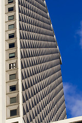 Image showing Mahhattan .Urban view at modern glass building with  blue sky