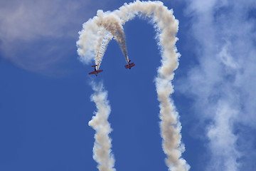 Image showing Two planes performing in an air show