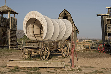 Image showing Western covered wagon on yard of Fort