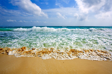 Image showing Waves on beautiful golden beach