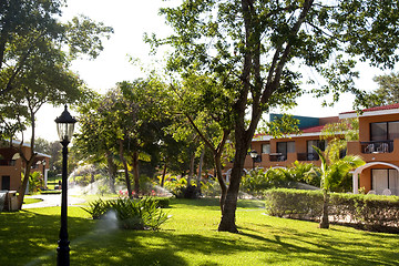 Image showing View of house with tropical plants