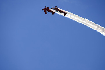 Image showing Two planes performing in an air show