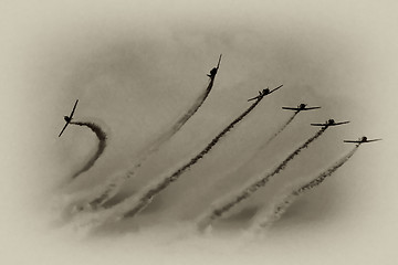 Image showing Several  planes performing in an air show