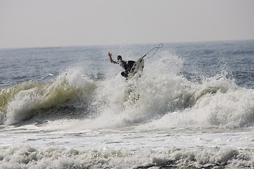 Image showing Backlit surfer