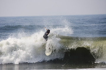 Image showing Backlit surfer