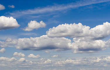 Image showing Heavy rain clouds in the blue sky 