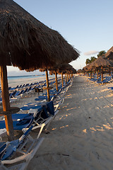 Image showing Sraw umbrella at sandy beach