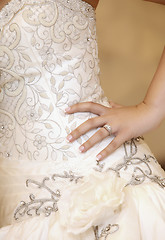 Image showing a beautiful traditional white wedding dress detail 