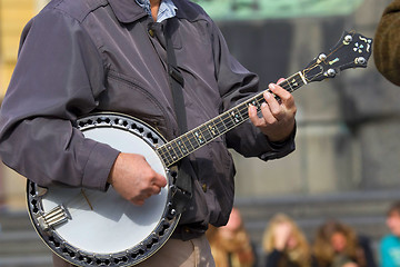 Image showing The street musician. Expression