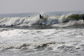 Image showing Backlit surfer