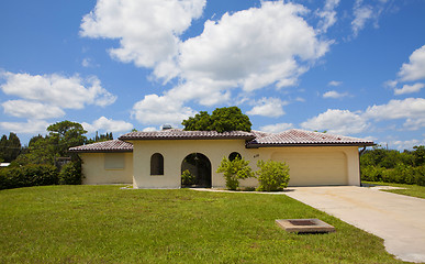 Image showing Luxury family house with landscaping on the front and blue sky o