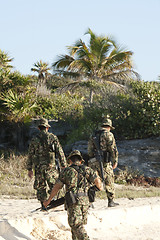 Image showing MEXICO - FEBRUARY 7: Soldiers on duty checkinf the boarder on Fe