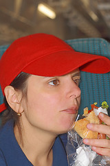 Image showing Girl eating sandwich