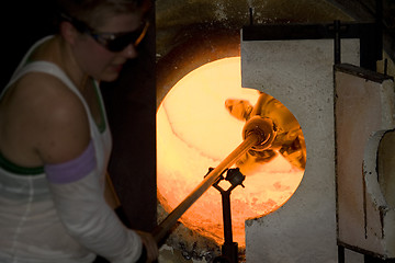 Image showing Glass furnace. Glass Blower at Work