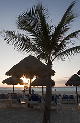 Image showing Sraw umbrella at sandy beach