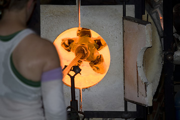 Image showing Glass furnace. Glass Blower at Work