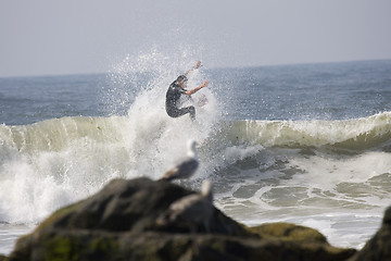 Image showing Backlit surfer