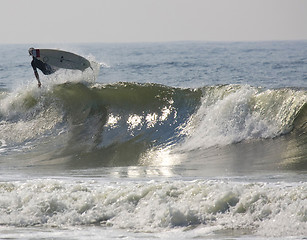 Image showing Stock Photo:
Surfing. Surfing is a sport. Only the dedicated and