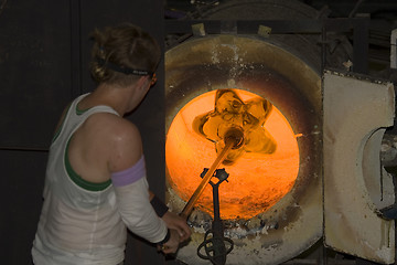 Image showing Glass furnace. Glass Blower at Work