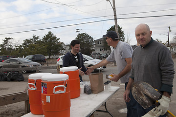 Image showing NEW YORK - November 12: Volunteers and workers helping people af