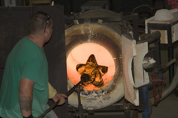 Image showing Glass furnace. Glass Blower at Work