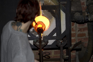 Image showing Glass furnace. Glass Blower at Work