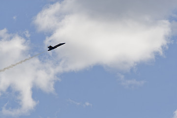 Image showing A plane performing in an air show