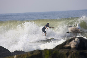 Image showing Backlit surfer