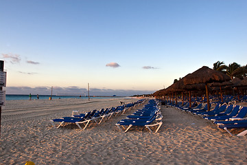 Image showing Sraw umbrella at sandy beach