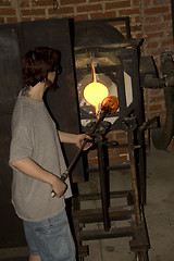 Image showing Glass furnace. Glass Blower at Work