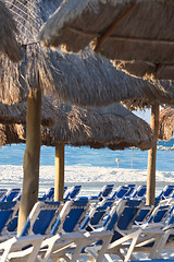 Image showing Sraw umbrella at sandy beach