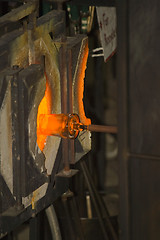 Image showing Glass furnace. Glass Blower at Work