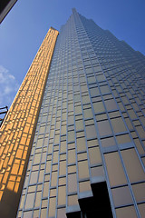 Image showing Mahhattan .Urban view at modern glass building with  blue sky