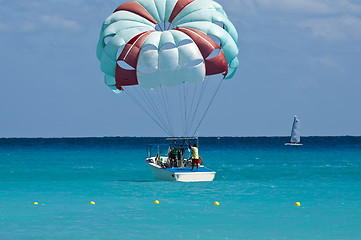 Image showing The parachuters are landed on a boat 