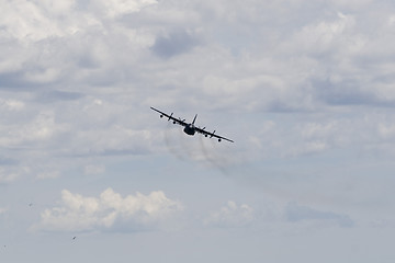 Image showing A plane performing in an air show