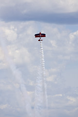 Image showing A plane performing in an air show