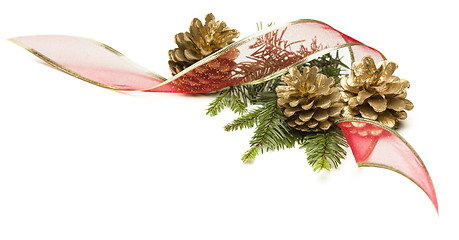 Image showing Pine Cones, Red Ribbon and Pine Branches Isolated on White