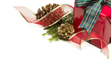 Image showing Christmas Present with Ribbon, Pine Cones and Pine Branches on W