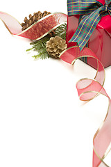 Image showing Christmas Present with Ribbon, Pine Cones and Pine Branches on W