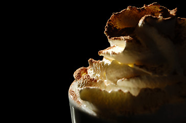 Image showing Hot chocolate topped with whipped cream and dusted with cocoa