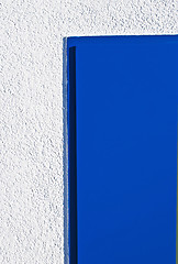 Image showing blue door and white wall