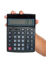 Image showing Hand with calculator