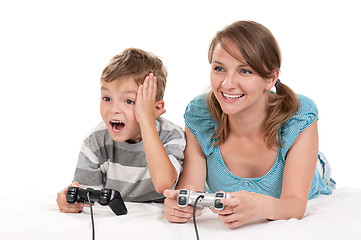 Image showing Happy family playing a video game